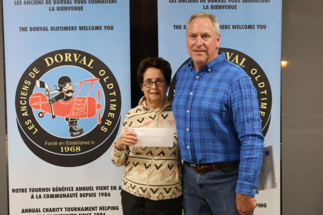 AWISH President accepts a cheque donation from Dorval Oldtimers